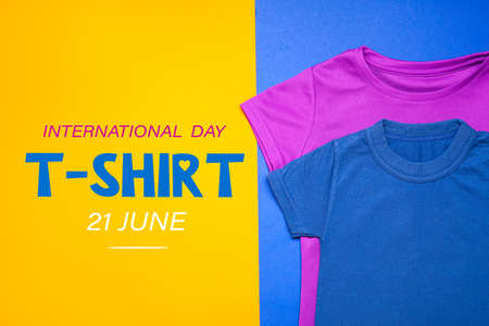 Two t-shirts on color background. International T-Shirt Day
