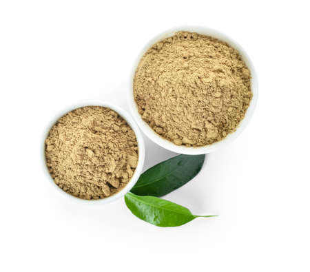 Bowls with hojicha powder on white background