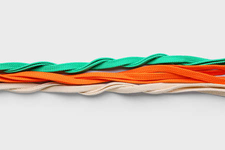 Different shoe laces on white background, closeup
