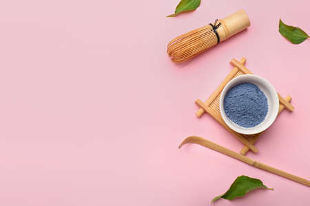 Composition with powdered blue matcha tea on color backgroundの写真素材