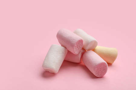 Sweet marshmallows on pink backgroundの写真素材