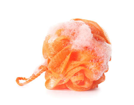 Orange bath sponge with foam on white background