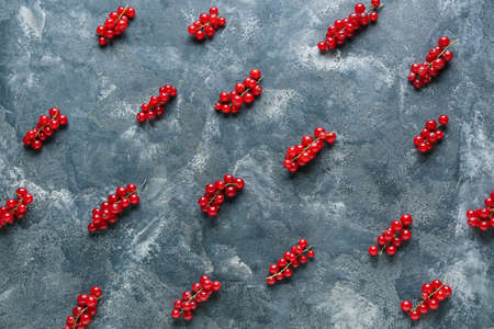 Fresh red currants on dark background