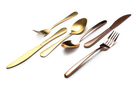 Set of stainless steel cutlery on white background