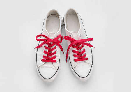 Stylish shoes with red laces isolated on white backgroundの写真素材