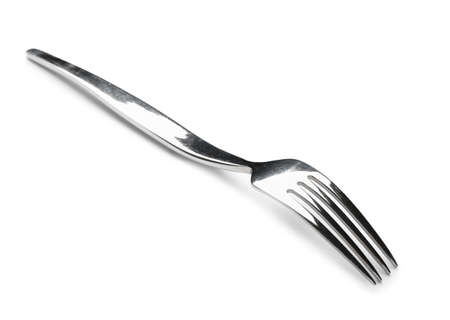Stainless steel fork on white background