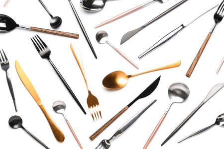 Set of different stainless steel cutlery on white backgroundの写真素材