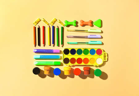 Stationery supplies on color background