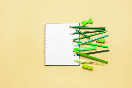 Stationery supplies on color background