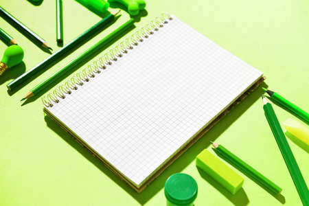 Stationery supplies on color background