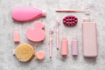 Composition with bath accessories and cosmetic products on grunge backgroundの写真素材