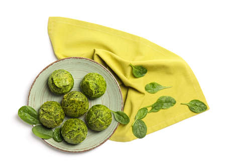 Plate tasty spinach muffins on white backgroundの写真素材