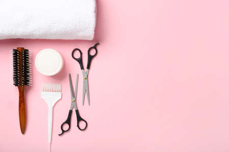 Set of hairdresser's tools on color background, top viewの写真素材