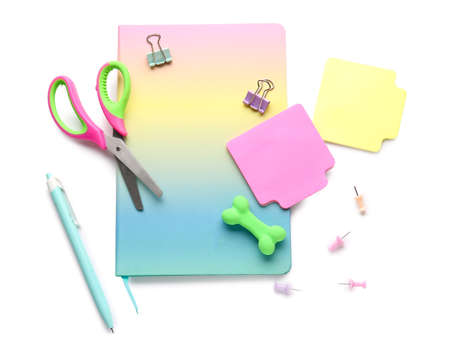 Colorful stationery supplies on white background
