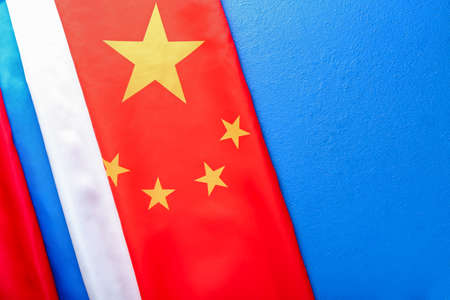 Flags of China and Russia on color backgroundの写真素材