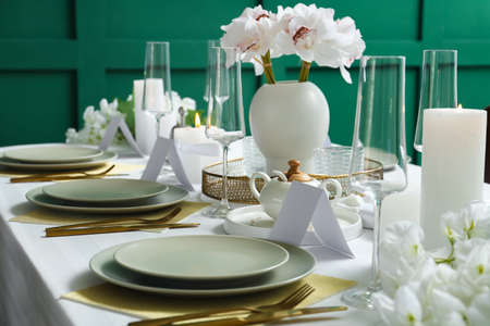 Beautiful table setting for wedding celebration in restaurantの写真素材