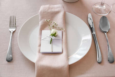 Beautiful table setting for wedding celebration in restaurant