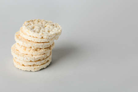 Stack of crispy rice crackers on gray backgroundの写真素材