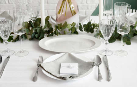 Beautiful table setting for wedding celebration in restaurantの写真素材