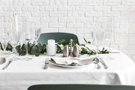 Beautiful table setting for wedding celebration in restaurantの写真素材