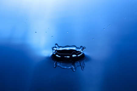 splash of water on blue background