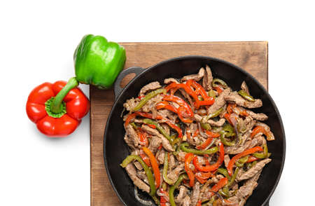 Delicious beef Fajita in frying pan on white backgroundの写真素材