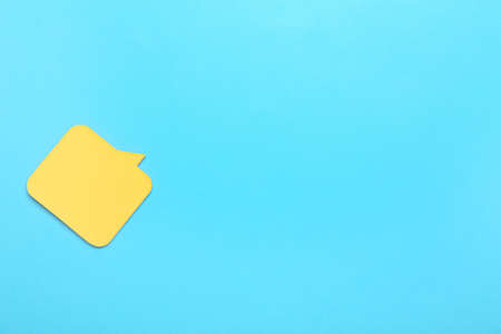 Sticky notes in shape of speech bubble on color background