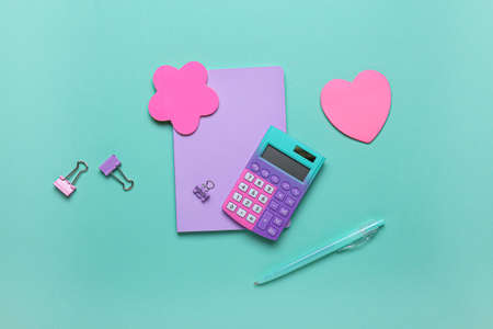 Set of different stationery with sticky notes on color backgroundの写真素材