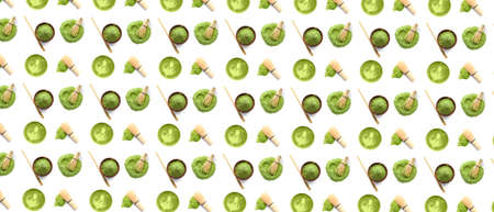 Powdered matcha tea and chasen with chashaku on white backgroundの写真素材