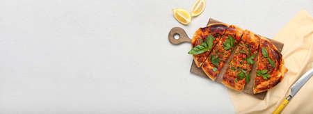 Tasty Turkish Pizza on light background with space for textの写真素材