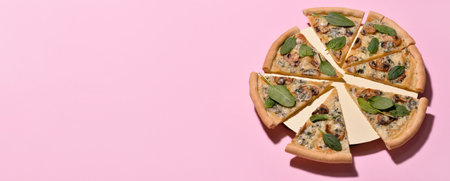 Slices of tasty vegetarian pizza on pink background with space for textの写真素材