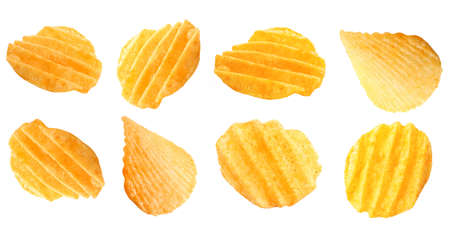Flying tasty potato chips on white backgroundの写真素材