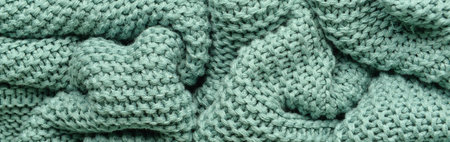 Texture of knitted fabric as background. banner design