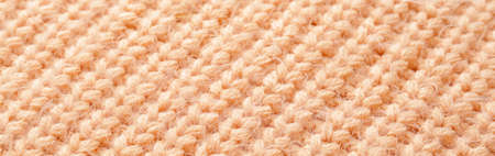Texture of knitted fabric as background, closeup. banner design