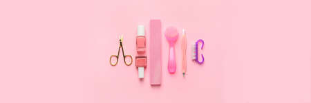 Set of manicure supplies on pink background, top viewの写真素材