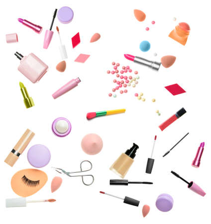 Set of cosmetics and makeup brushes isolated on whiteの写真素材