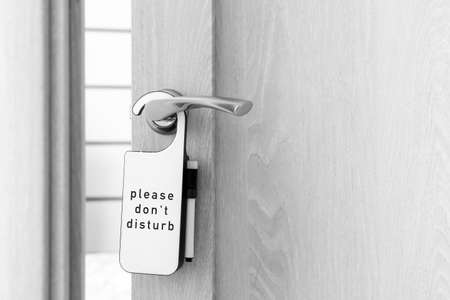 DO NOT DISTURB sign on door of hotel room, closeupの写真素材