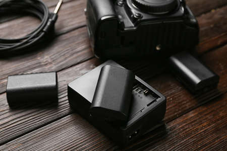 Photo equipment on wooden background, closeup