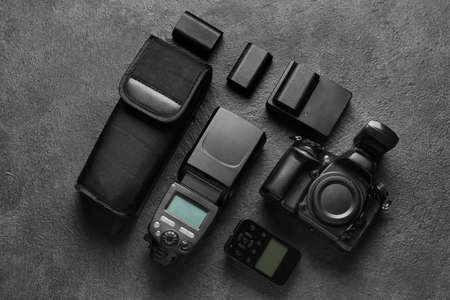 Photo equipment on dark textured background