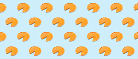 Many tasty pumpkin pies on light blue background. pattern for design