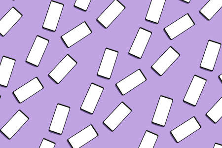 Many smartphones with blank screens on lilac background. pattern for design