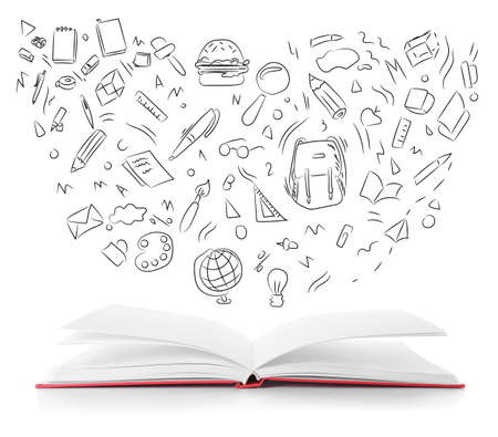 Open book and drawn school supplies on white backgroundの写真素材