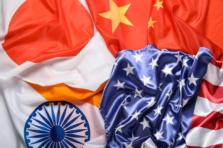 Flags of Japan, India, China and USA as backgroundの写真素材