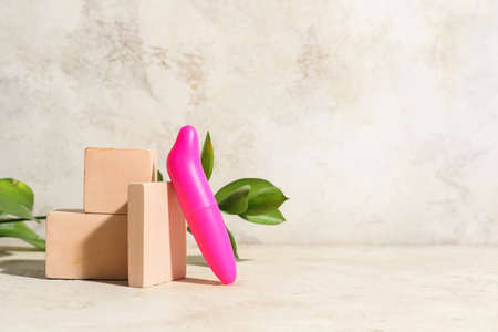 Vibrator from sex shop on light background