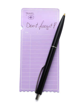 Note with text DON'T FORGET and pen on white background