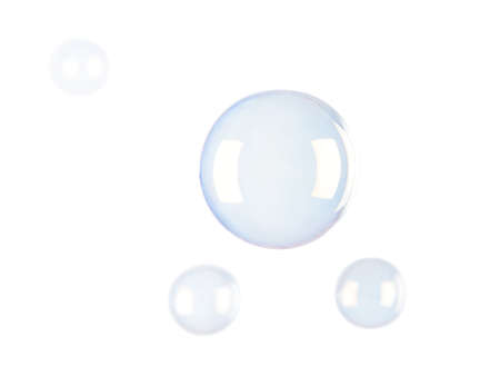 Soap bubbles isolated on whiteの写真素材