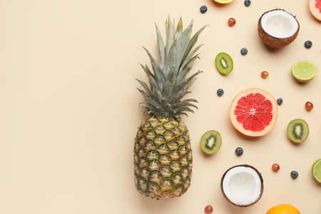 Composition with different fruits and berries on color backgroundの写真素材