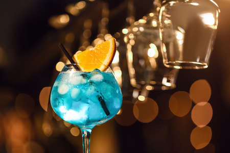 Glass of Blue cocktail in barの写真素材