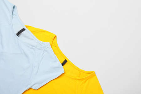 Stylish t-shirts isolated on white background, closeupの写真素材