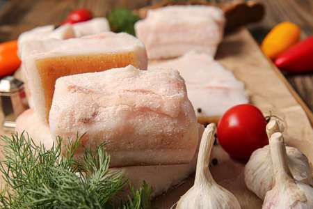 Pieces of salted lard on tableの写真素材